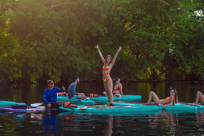Paddleboarding and/or kayaking tour at sunrise in the lagoon of Bacalar - Cenote de la Bruja and the dark-water setting