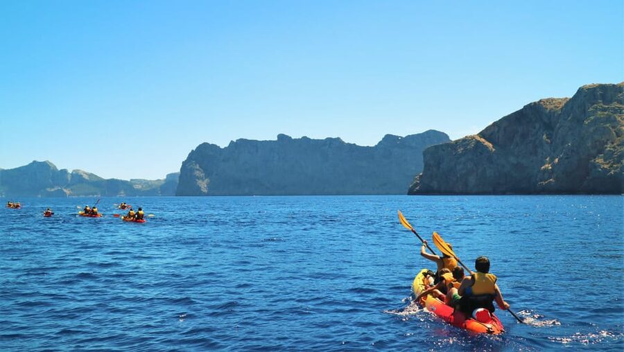 Pollença: Kayak and Coasteering Cliff Jumping - Cliff jumping, snorkeling, and deep water soloing