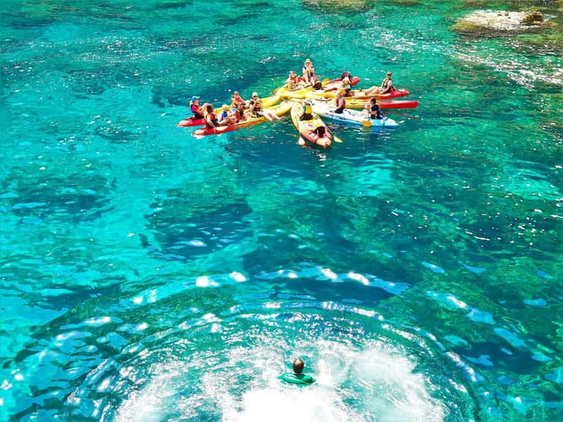 Pollença: Kayak Discovery – Snorkeling and Caves - Paddling out from Cala Molins