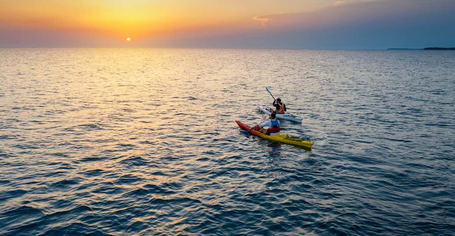 Poreč: Sea Kayaking Sunset Tour - The halfway pause for swimming, snacks, and a drink