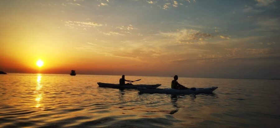 Poreč: Sea Kayaking Sunset Tour - Sunset, open water, and the chance of dolphins