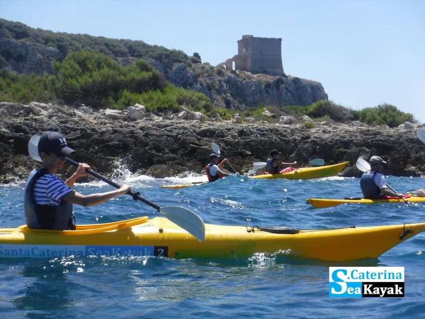 Porto Selvaggio kayak tour + cliff diving + cold springs - Paddling under S. Maria dell’Alto Tower