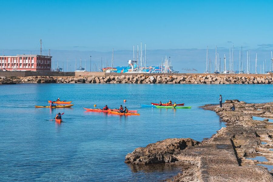 Porto Torres: Guided Kayaking Excursion - The Return to Scogliolungo Beach