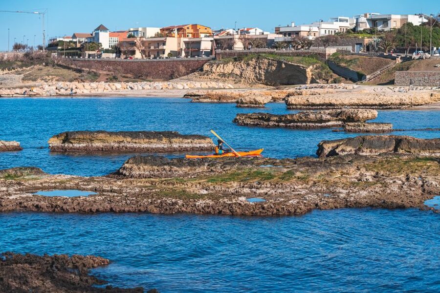 Porto Torres: Guided Kayaking Excursion - Entering Two or Three Porto Torres Caves