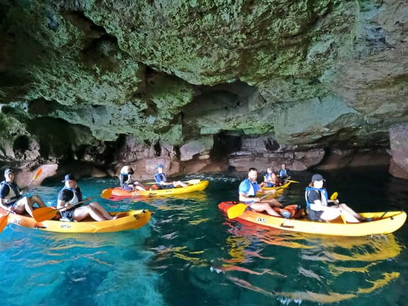 Puerto Mogán: Guided Adventure Kayak Tour in Caves & Snorkel - Optional cliff jumps, with real rock underfoot