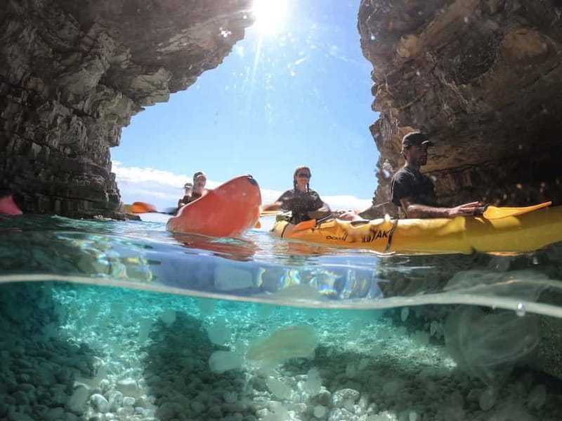 Pula: Cave Kayak, Snorkeling, Cliff Jumping All-in-one Tour - Swimming inside the cave