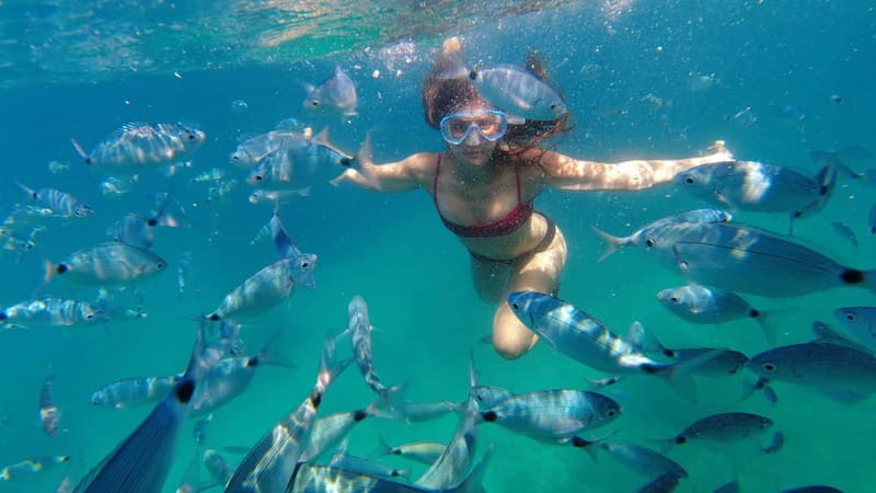 Pula: Cave Kayak, Snorkeling, Cliff Jumping All-in-one Tour - Getting to the Windsurf Station