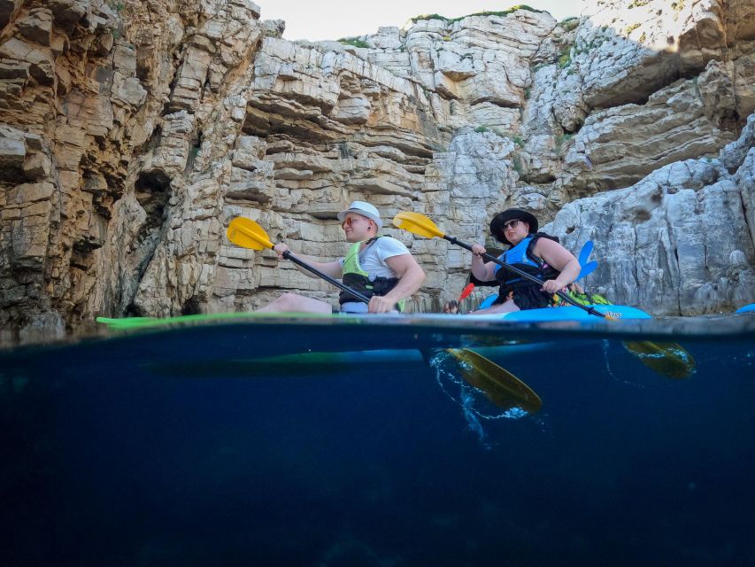 Pula: Kayaking,Snorkeling, Cliff jumping Tour with Wetsuit - Drinks, showers and the finish