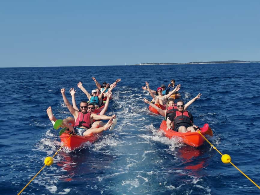 Pula: Sea Adventure – Boat, Kayak, Snorkeling & Cliff Jumps - Rocky passages and a sea cave near the cliffs