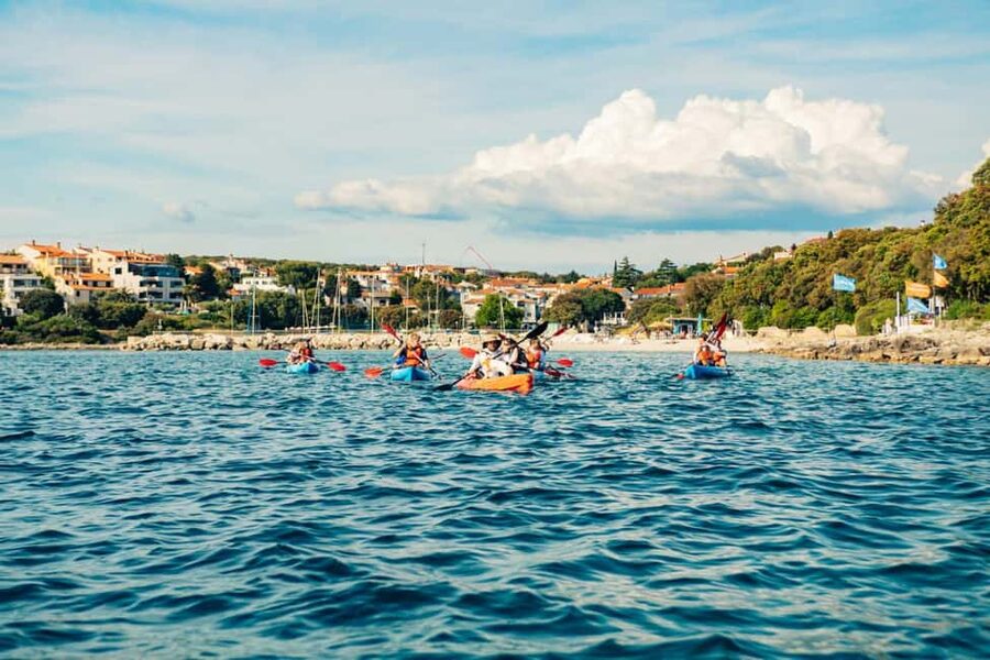 Pula: Three Island Kayak Tour with Cave Photo & Snorkeling - Paddling toward Fratarski Island