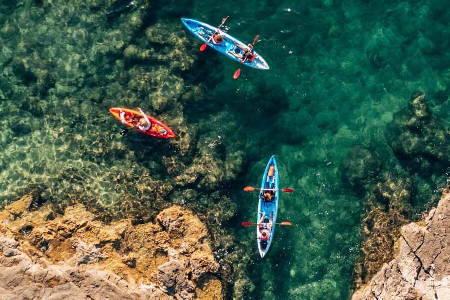 Pula: Three Island Kayak Tour with Cave Photo & Snorkeling - Getting ready at the Pula waterfront