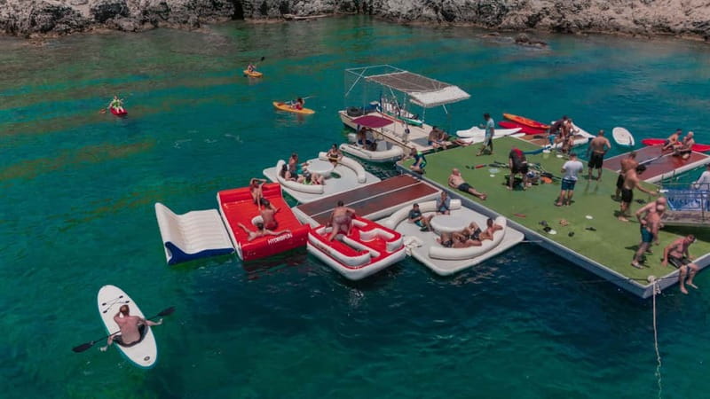Rhodes: Gulet Trip with Food, Drinks, SUP, Kayak & Swimming - A traditional gulet leaving Mandraki Port