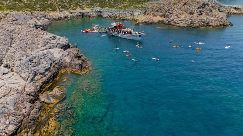 Rhodes: Gulet Trip with Food, Drinks, SUP, Kayak & Swimming - What the $104 price really covers