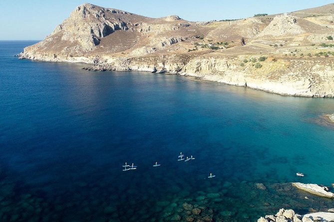 Rhodes: Stand Up Paddle & Snorkel Adventure - Paddling beneath the cliffs