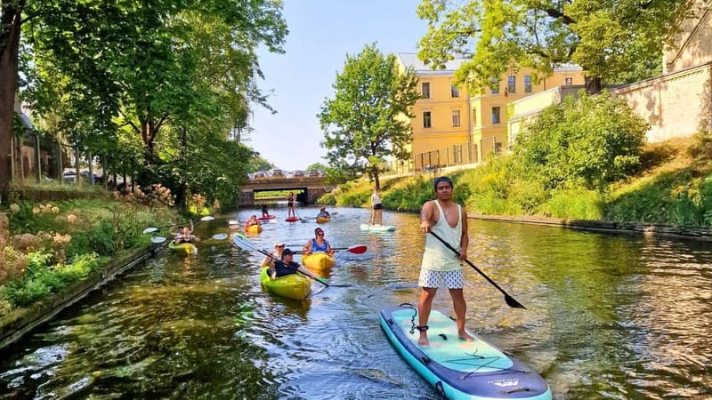 Riga: Kayak Rental in the City Center - Passing Riga Central Market by kayak