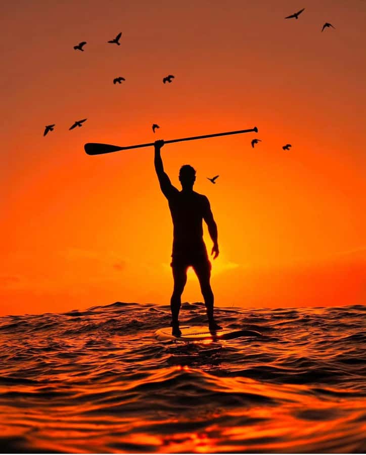 Rio de Janeiro: Copacabana Sunrise Stand Up Paddleboard Tour - Paddling as Copacabana turns gold