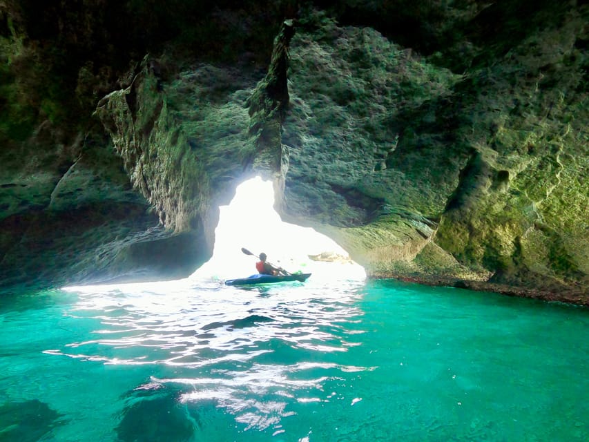 Roca Vecchia: Kayak and Canoe Tour to La Grotta della Poesia - Fitness, comfort, and group size