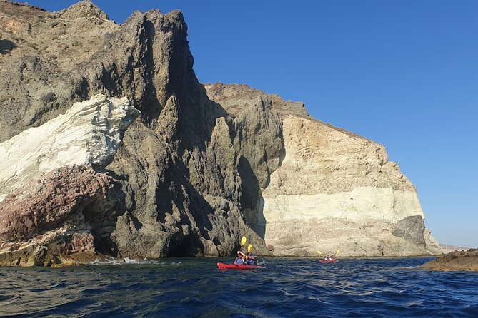 Santorini Sea Kayak - South Discovery, Small Group incl. Sea Caves and picnic - Sunset departures and weather decisions