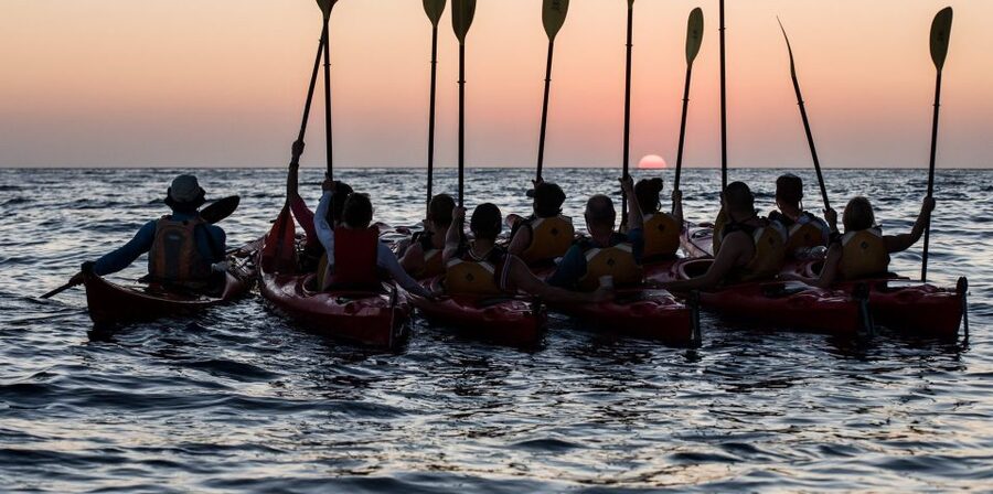 Santorini: Sunset Sea Kayak with Light Dinner - Learning to handle the two-person kayaks