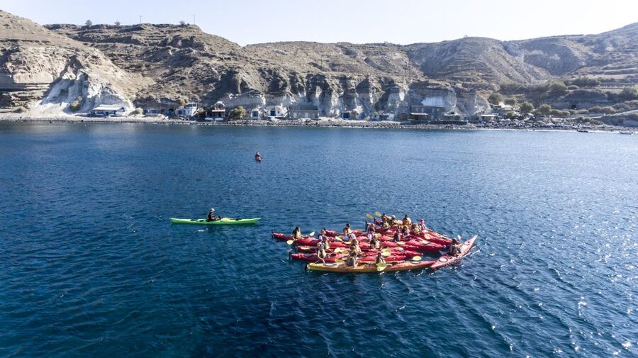 Santorini: Sunset Sea Kayak with Light Dinner - White Beach and the volcanic coast
