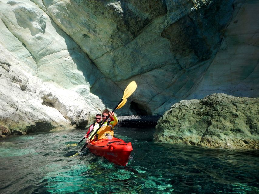 Santorini: Sunset Sea Kayak with Light Dinner - Kampia Beach, swimming, and a fresh snack