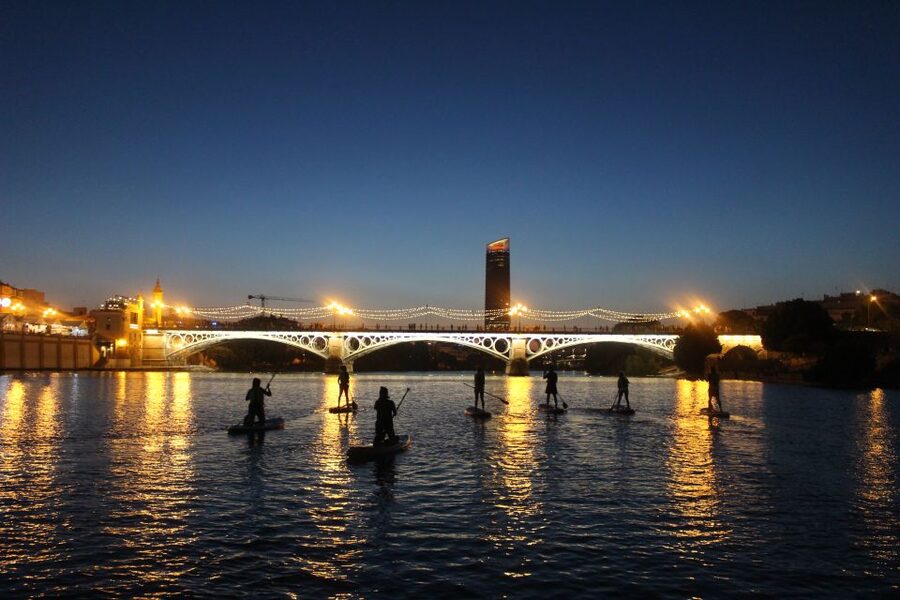 Seville: Sunset and Evening Paddle Boarding Tour - Torre del Oro from the river