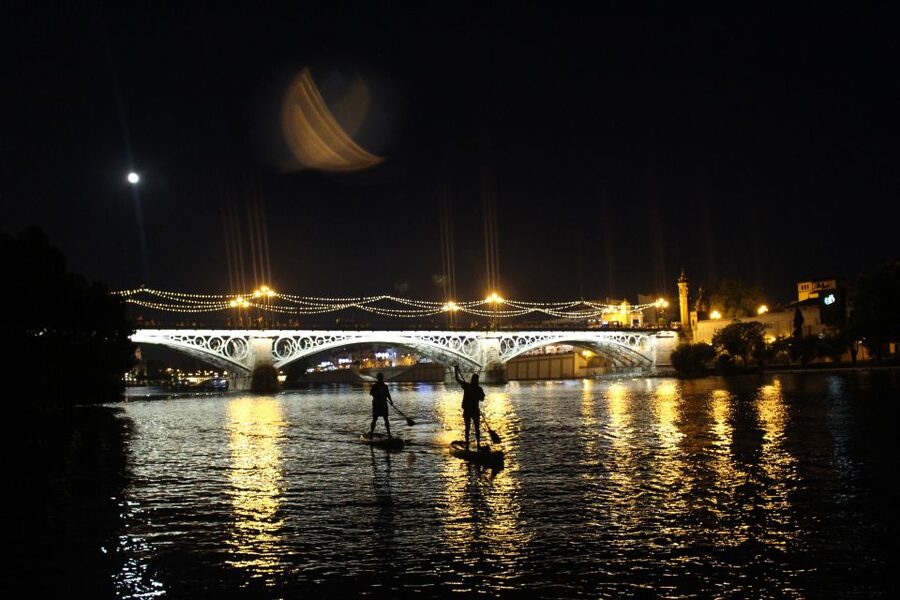 Seville: Sunset and Evening Paddle Boarding Tour - Torre de Sevilla, bridges, and the changing city lights