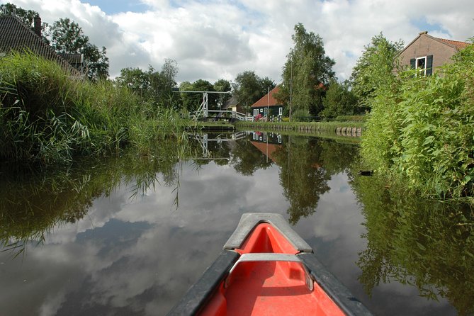 Small-Group Guided Sunset Canoe Tour in Waterland with Dinner - The picnic stop beside a lake
