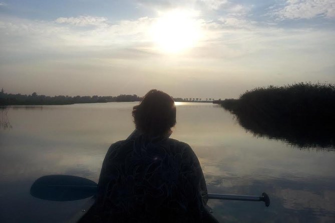 Small-Group Guided Sunset Canoe Tour in Waterland with Dinner - Sunset, windmills, and the weather question