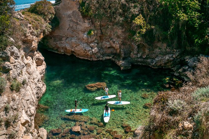 Small group paddle boarding tour to Bagni Regina Giovanna - Swimming, photos, and time at the ruins