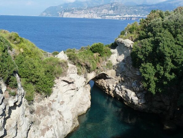 Small group paddle boarding tour to Bagni Regina Giovanna - Paddling toward Punta del Capo