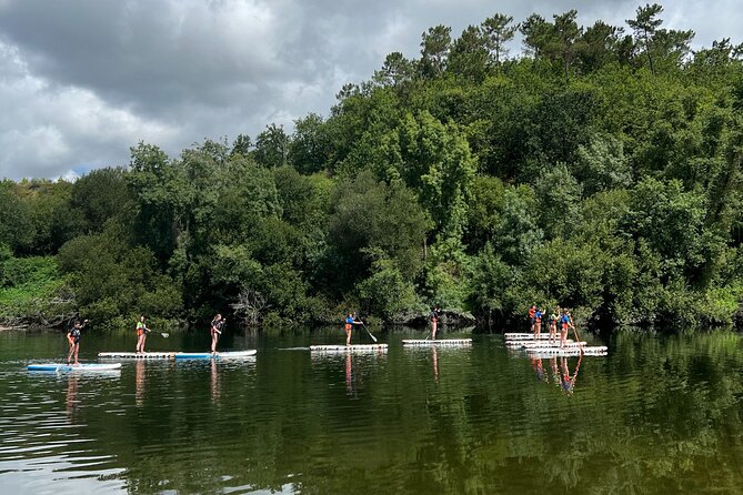 Stand Up Paddle Tour - Paddling toward caves, rocks, and small beaches