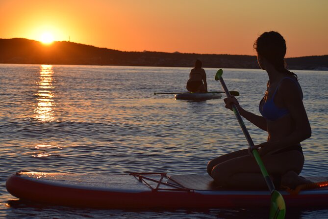 Stand Up Paddle With Dolphins, aperitif and pictures - Swimming at Cala Moresca