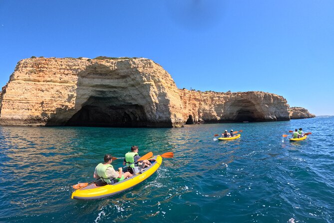 Sunrise Small Group Kayak Experience in BENAGIL Cave & 4K Photos - Paddling past Carvalho’s rock tower