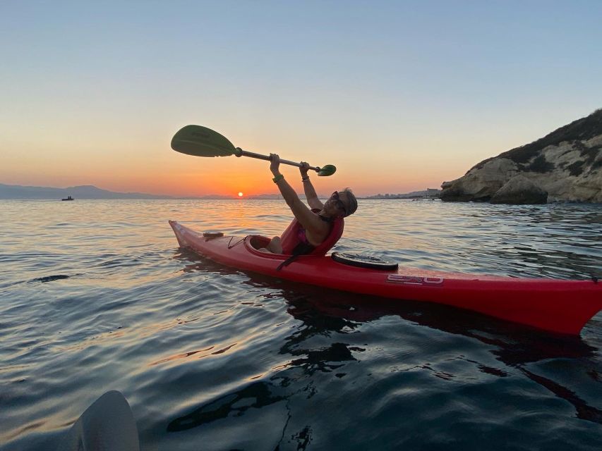 Sunset kayak tour Sella del diavolo - Caves, rock shapes, and Sardinian stories