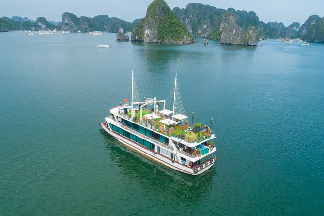 Sweetness Cruise Ha Long Bay: Caves, Kayaking, Swimming & Lunch - Sunset fruit, music, and the jacuzzi