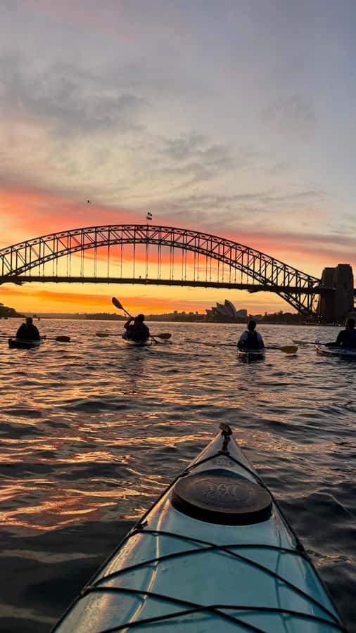 Sydney Sunrise Kayak Tour on Sydney Harbour - The Opera House in the sunrise glow