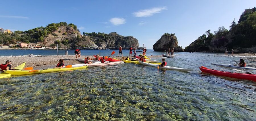 Taormina: Kayak Coastal Tour to Isola Bella and Blue Grotto - Paddling across the bay toward Isola Bella