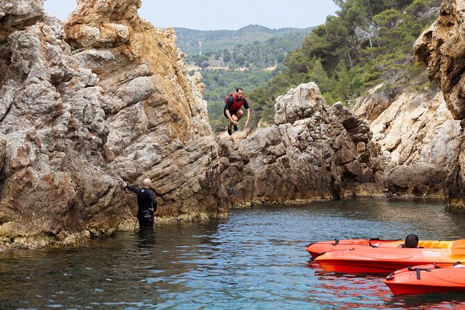 Tossa de Mar: Kayak & Snorkel Tour with Paella from Barcelona - Paddling through coves and sea caves