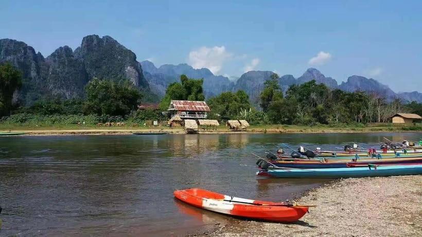Vang Vieng: Day Tour with Kayaking, Ziplining, and Rafting - Local lunch and the one-hour pause