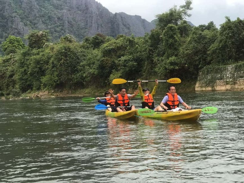 Vang Vieng: Day Tour with Kayaking, Ziplining, and Rafting - Pickup in Vang Vieng and the tuk-tuk ride